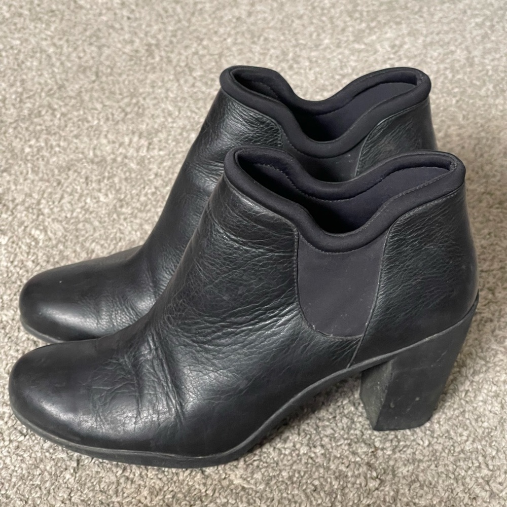Clarks Adya Bella Black Pebble Leather booties.